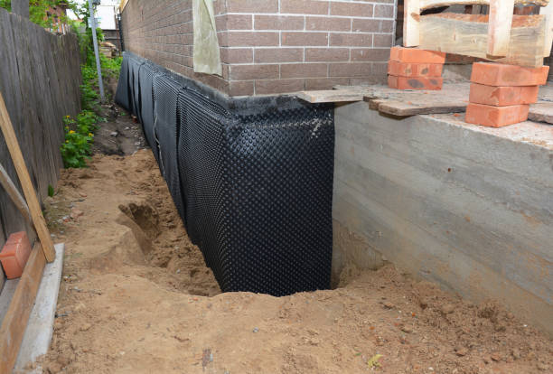 Happy homeowners after waterproofing job in Andover